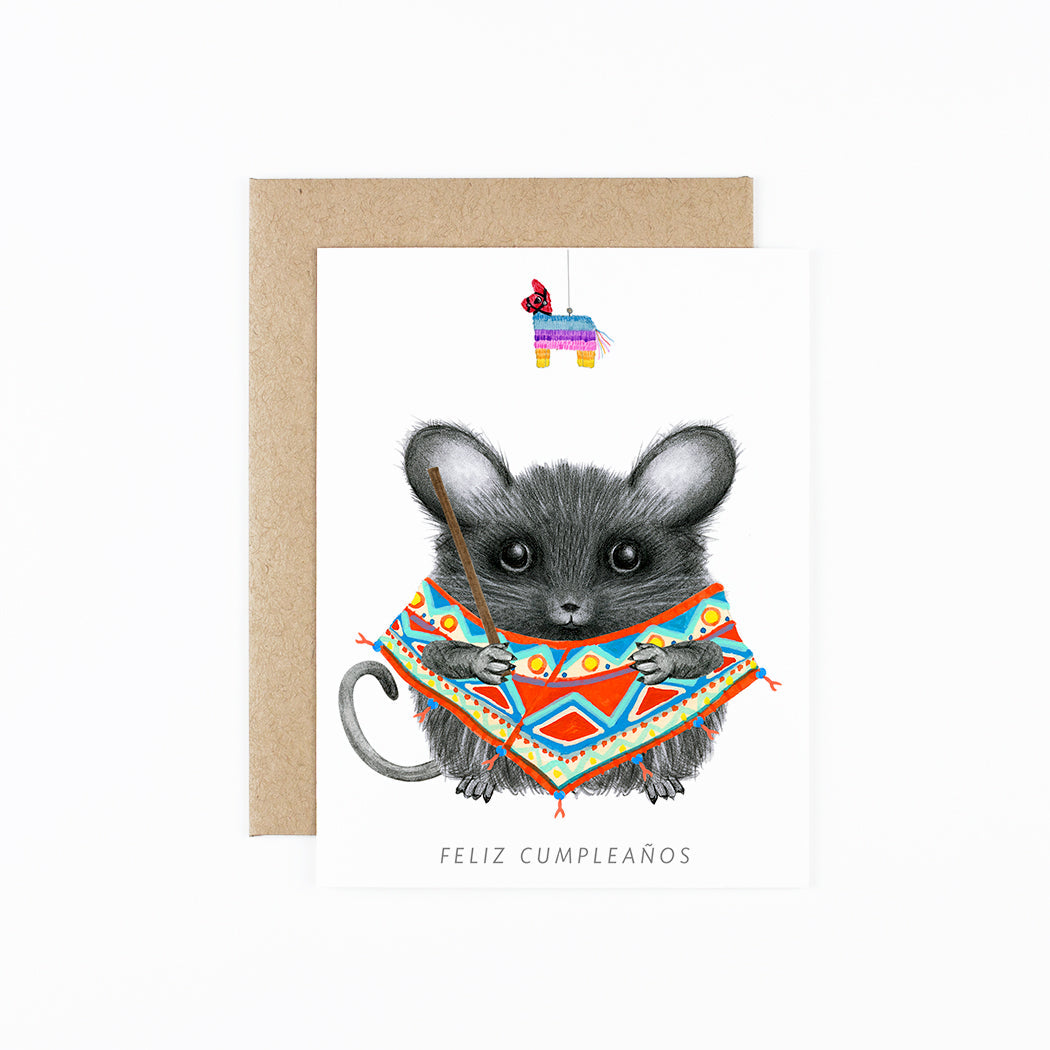 Mouse wearing a Poncho  